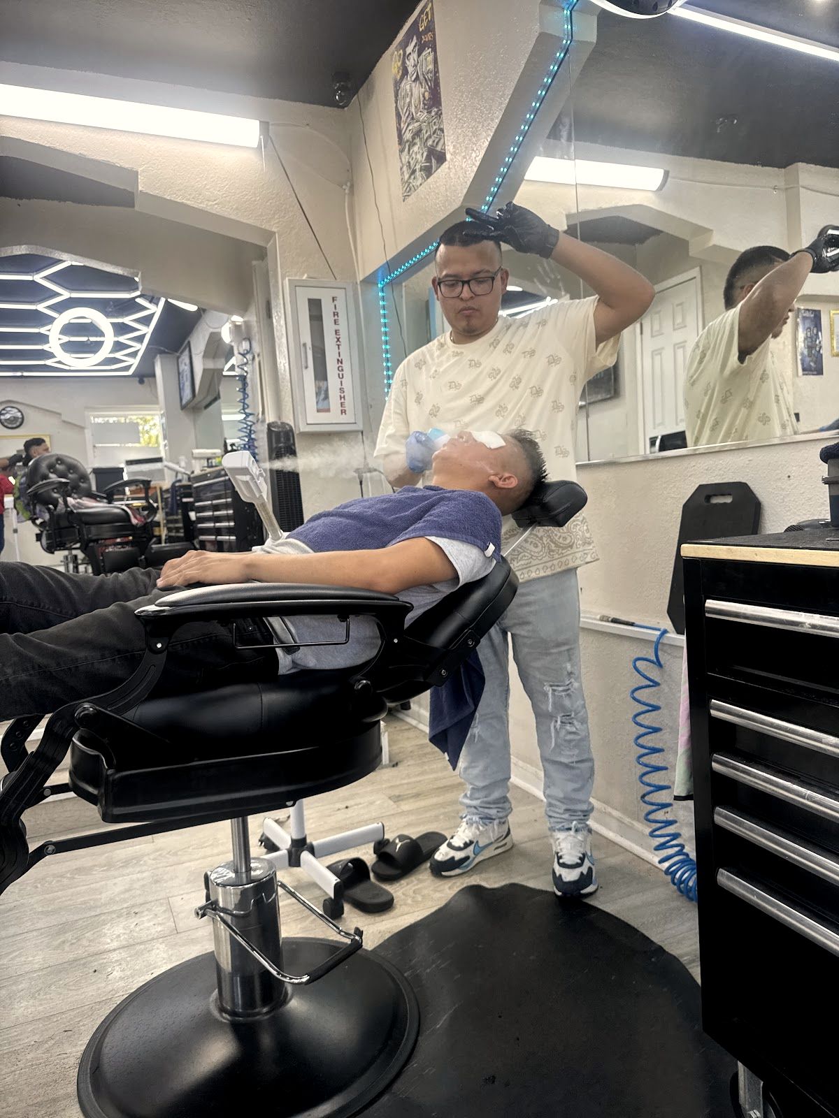 A fade in progress at IMPERIO Barber King